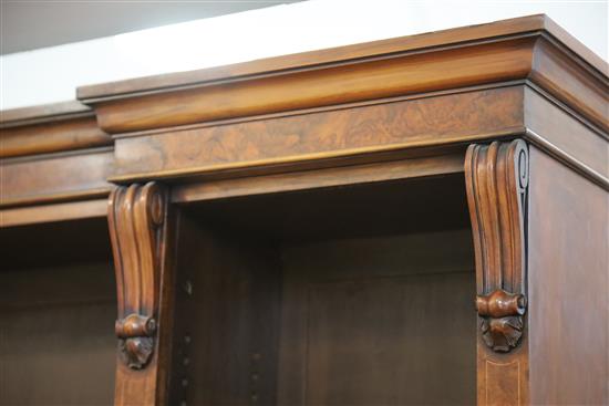 A Victorian figured walnut inverse breakfront library bookcase, W.6ft 1in. D.1ft 4in. H.7ft 6in.